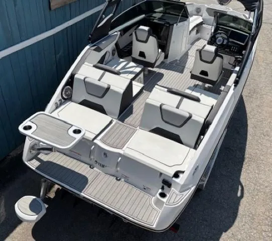 Slide: The Image of 2023 Yamaha Boats 222SD interior with modern seating and sleek design. - 11