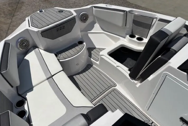 Slide: The Image of 2023 Yamaha Boats 222SD interior with seating and storage compartments. - 13