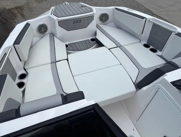 Slide: The Image of 2023 Yamaha Boats 222SD interior with spacious seating and modern design. - 14