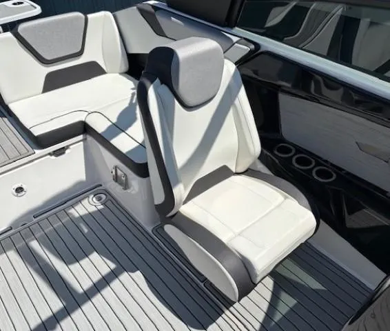 Slide: The Image of 2023 Yamaha Boats 222SD interior with sleek, modern seating and stylish design. - 17