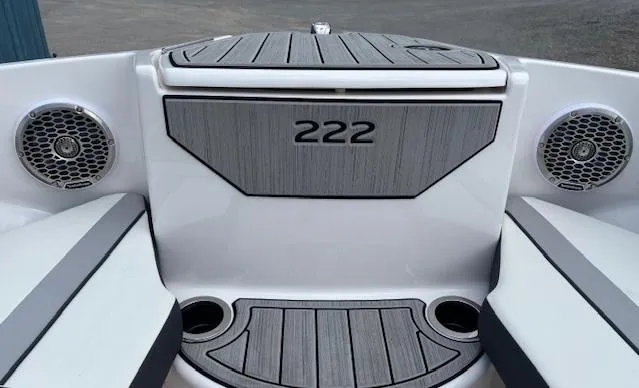 Slide: The Image of 2023 Yamaha Boats 222SD interior with speakers and seating, showcasing modern design. - 31