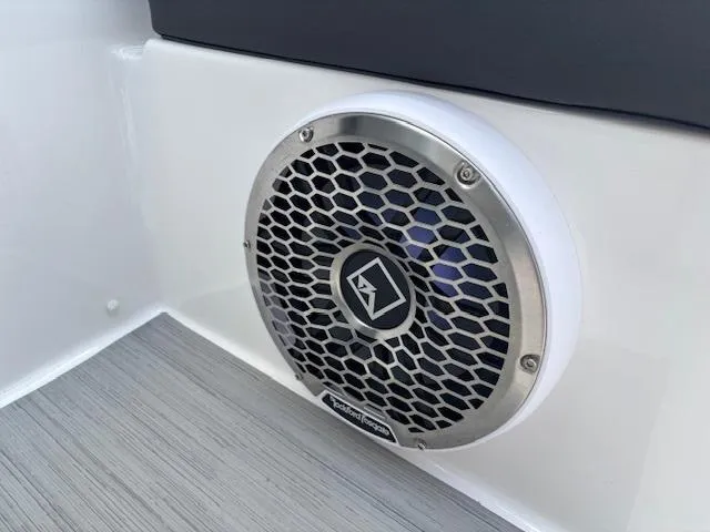 Slide: The Image of 2023 Yamaha Boats 222SD speaker with hexagonal grille on sleek interior panel. - 32