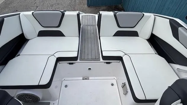 Slide: The Image of 2023 Yamaha Boats 222SD interior with white and gray seating, modern design. - 35