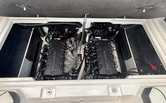 Slide: The Image of 2023 Yamaha Boats 222SD engine compartment with dual engines, showcasing advanced marine technology. - 39