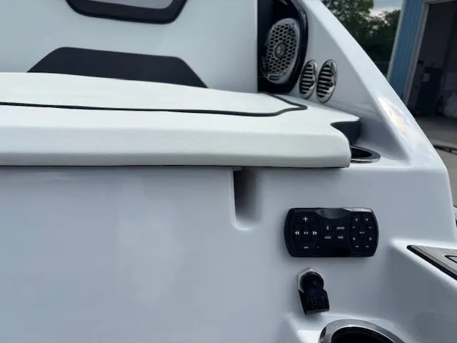 Slide: The Image of 2023 Yamaha Boats 222SD interior with speaker and control panel. - 42