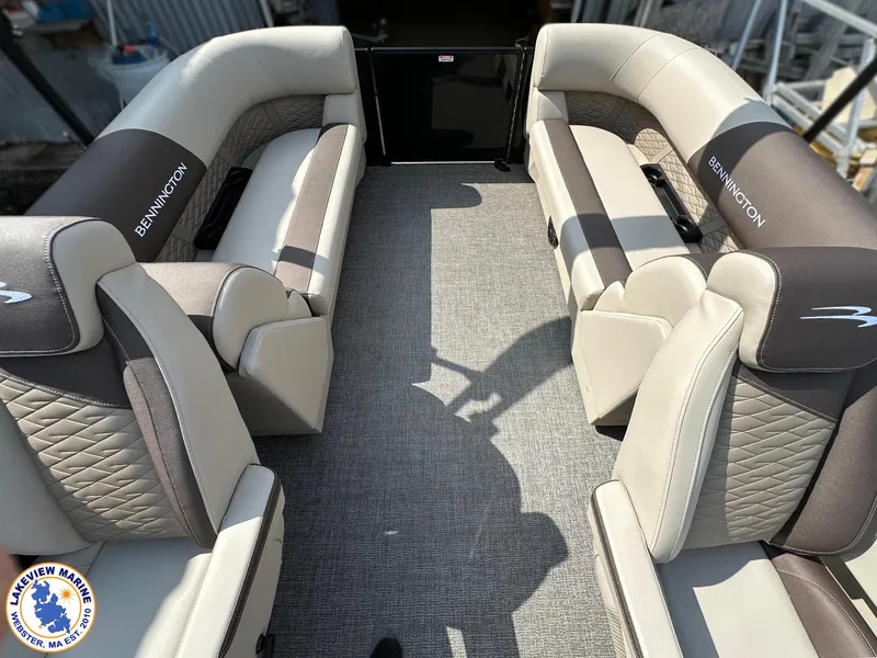 Slide: The Image of 2025 Bennington 22 SSR boat interior with luxurious seating and elegant design. - 11