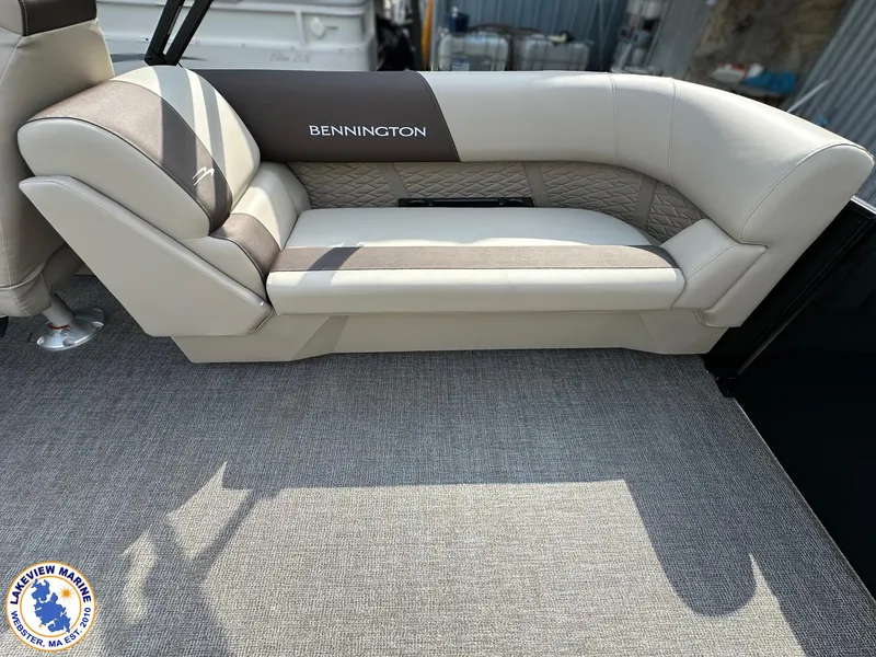 Slide: The Image of 2025 Bennington 22 SSR boat interior with beige and brown seating, Lakeview Marine logo visible. - 12