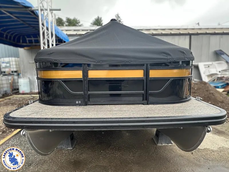 Slide: The Image of 2025 Bennington 22 SSR pontoon boat with cover, displayed at Lakeview Marine. - 14