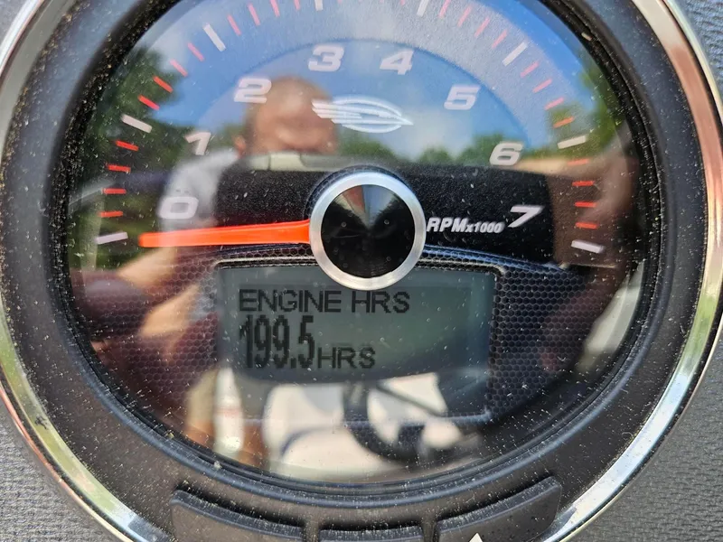 Slide: The Image of Close-up of Chaparral 246 SSi tachometer showing 199.5 engine hours. - 11