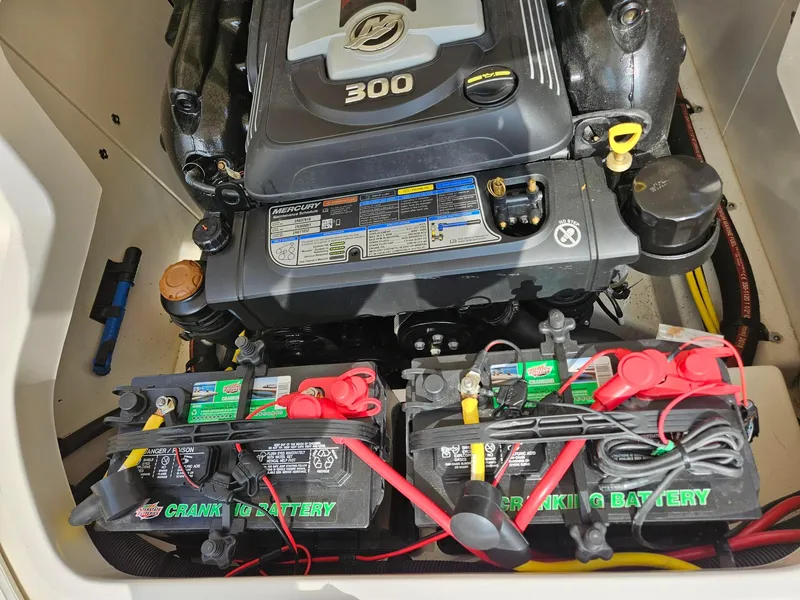 Slide: The Image of Engine compartment of 2019 Chaparral 246 SSi with Mercury 300 engine and dual cranking batteries. - 20