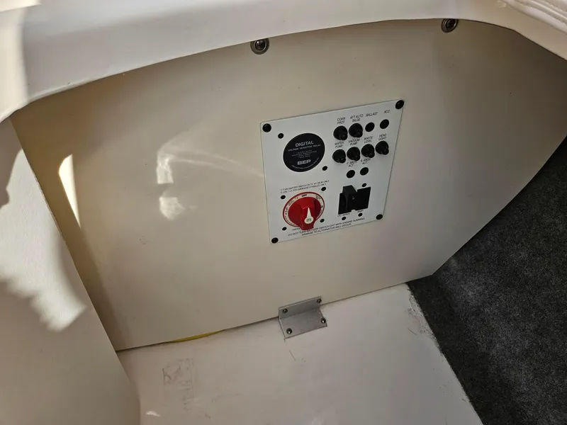 Slide: The Image of Control panel on a 2019 Chaparral 246 SSi boat interior. - 27