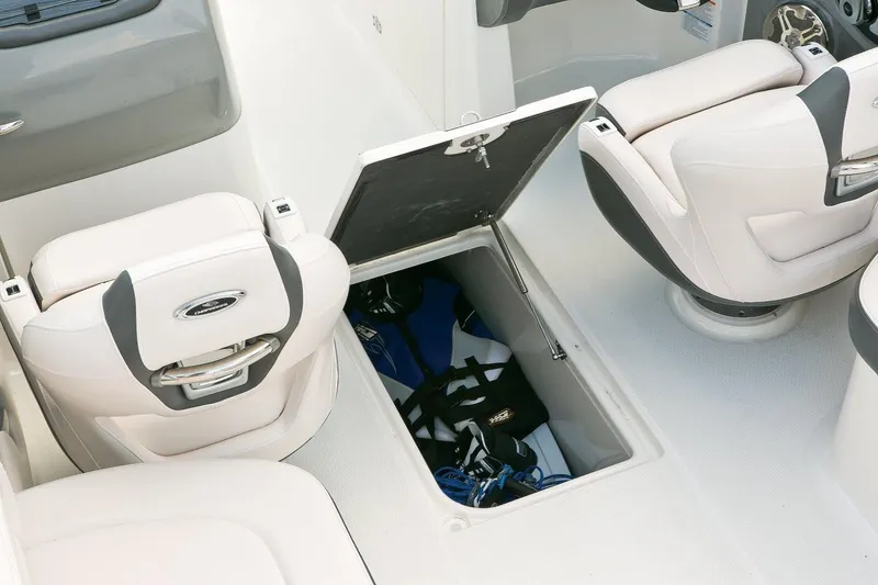 Slide: The Image of Manufacturer Provided Image: 2019 Chaparral 246 SSi boat interior with open storage compartment. - 37