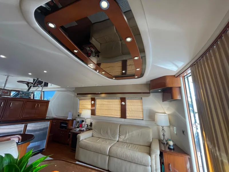 Slide: The Image of Luxurious interior of 2006 Carver 56 Voyager yacht with modern furnishings and elegant lighting. - 27