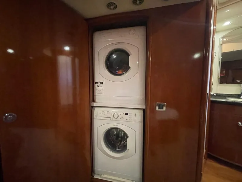 Slide: The Image of Stacked washer and dryer in 2006 Carver 56 Voyager yacht interior. - 43