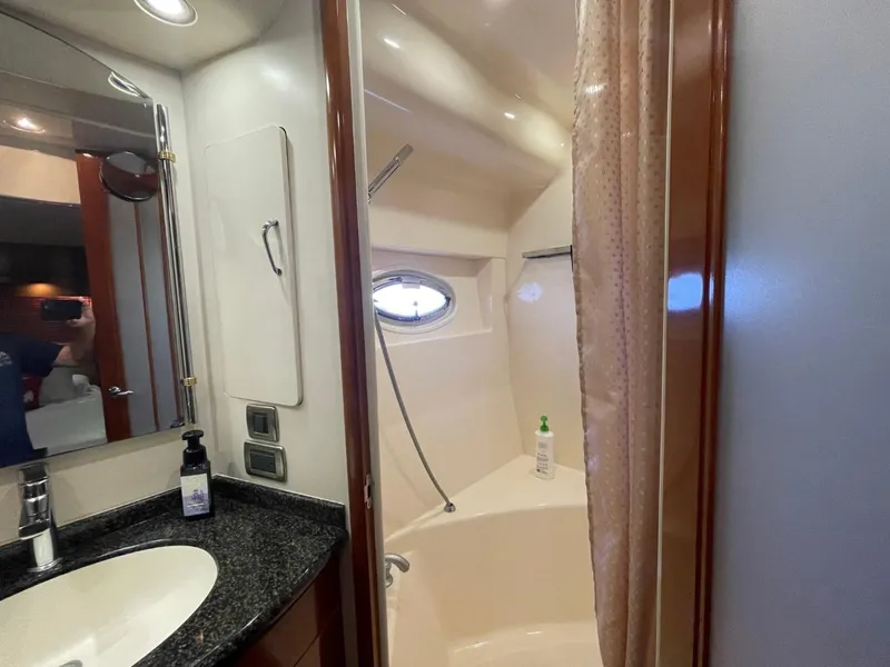Slide: The Image of Bathroom interior of 2006 Carver 56 Voyager yacht with sink and shower. - 49