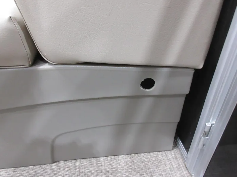 Slide: The Image of Interior detail of 2022 Sun Tracker Party Barge 22 RF DLX with a small hole. - 9