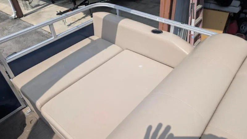 Slide: The Image of 2020 Sun Tracker Party Barge 22 RF XP3 with beige seating and cup holder. - 6