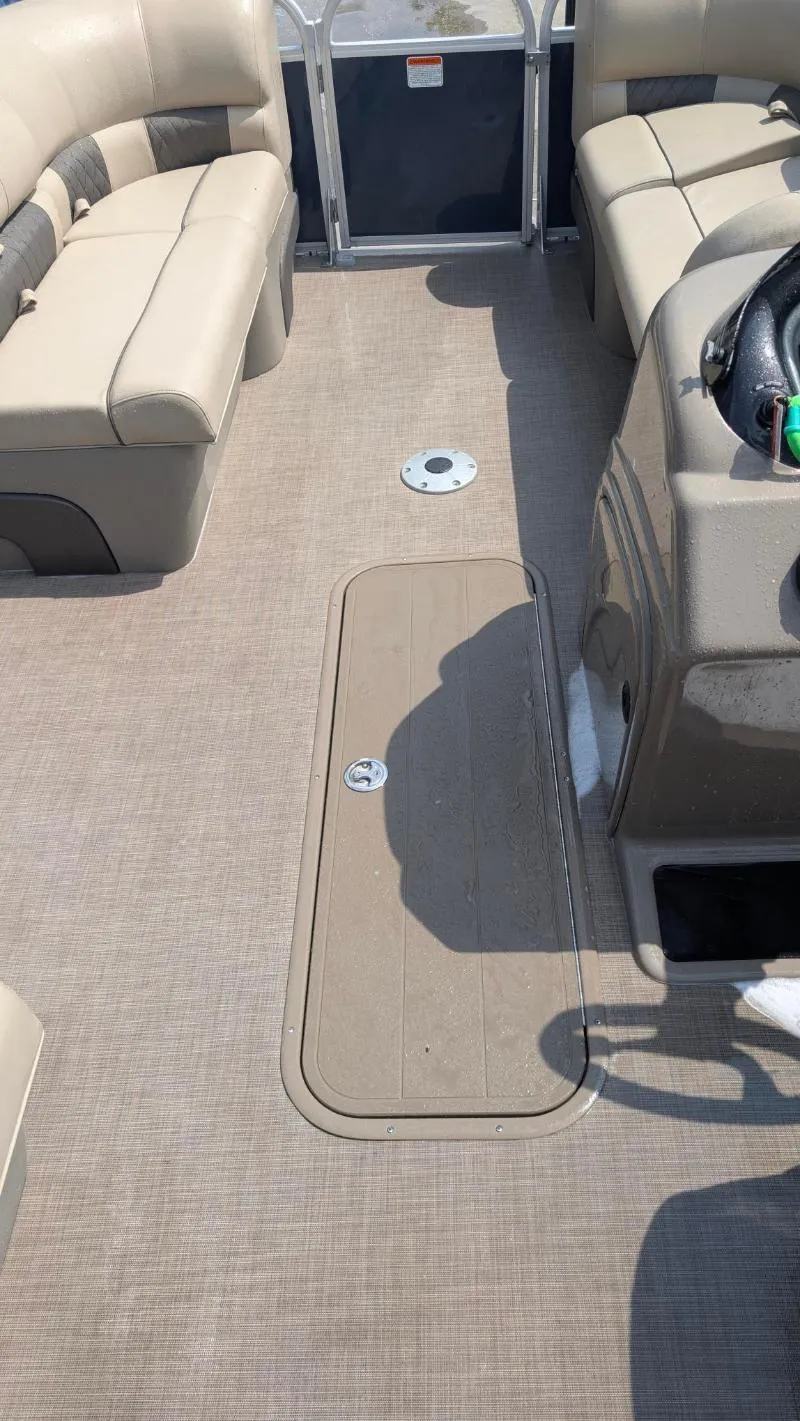 Slide: The Image of Interior of 2020 Sun Tracker Party Barge 22 RF XP3 with beige seating and flooring. - 8