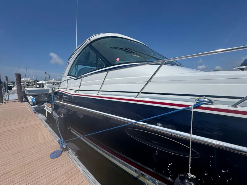 Slide: The Image of 2013 Formula 45 Yacht docked under clear blue sky. - 11
