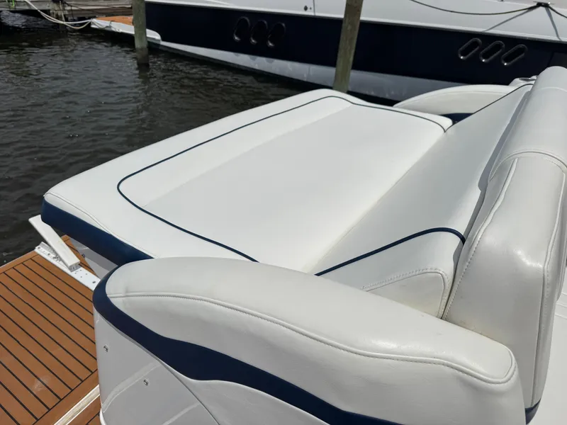 Slide: The Image of Luxury seating on a 2013 Formula 45 Yacht, docked by the water. - 18