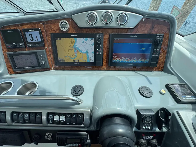 Slide: The Image of Control panel of a 2013 Formula 45 Yacht with navigation screens and gauges. - 31