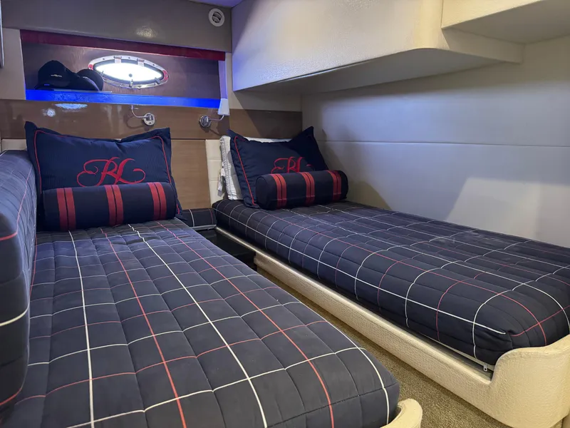 Slide: The Image of Interior cabin of 2013 Formula 45 Yacht with twin beds and nautical-themed bedding. - 39