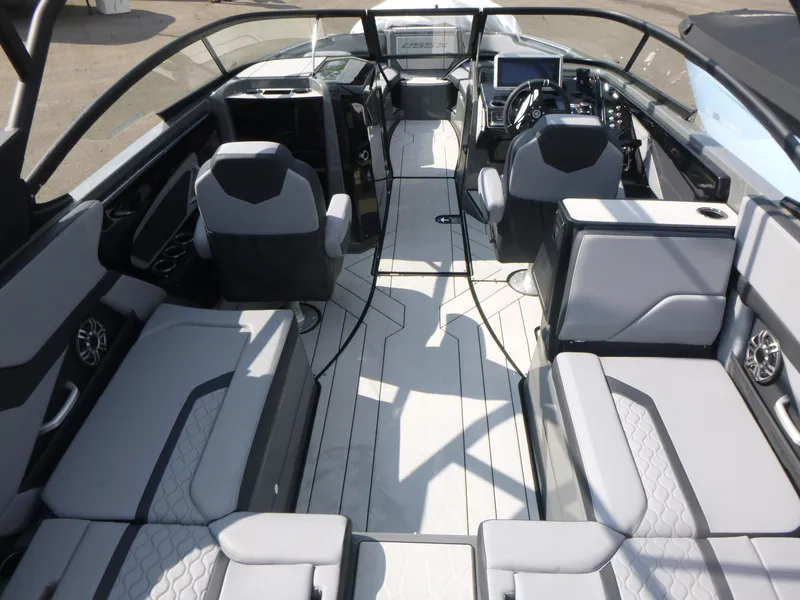 Slide: The Image of 2025 Yamaha Boats 255XE interior with modern seating and sleek design. - 4