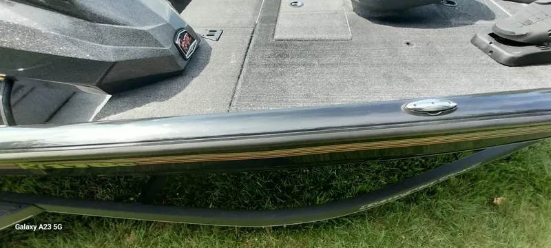 Slide: The Image of 2024 Ranger RT178C boat deck detail with sleek design and modern features. - 13