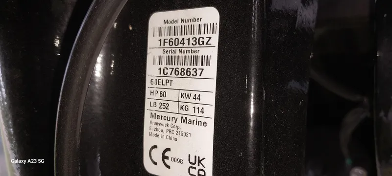 Slide: The Image of Label on a Mercury Marine engine, showing model and serial numbers, with specifications. - 41