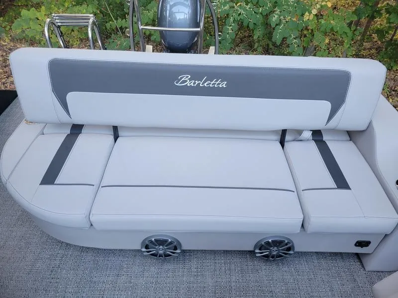 Slide: The Image of 2025 Barletta A20UC boat seat with gray upholstery and integrated speakers. - 14