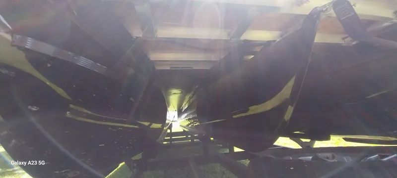 Slide: The Image of Underneath view of a 2023 Regency 250 LE3 Sport boat, showcasing its structure and design. - 24