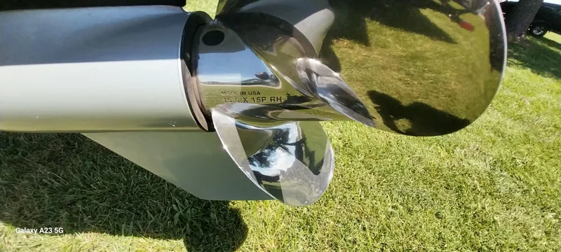 Slide: The Image of Close-up of a shiny boat propeller on a 2023 Regency 250 LE3 Sport. - 29