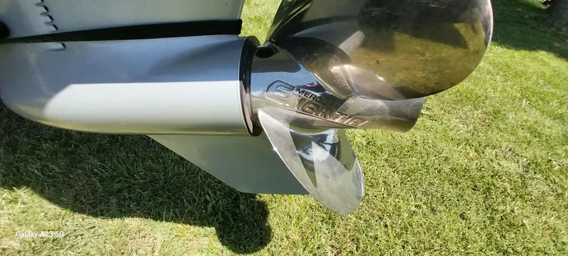 Slide: The Image of Propeller of 2023 Regency 250 LE3 Sport boat on grass. - 30