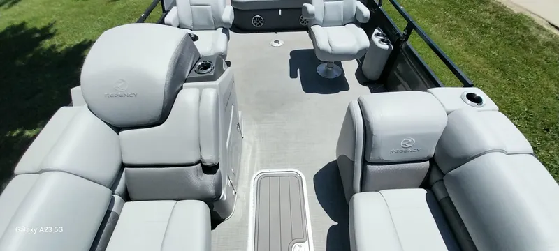 Slide: The Image of Luxurious 2023 Regency 250 LE3 Sport boat interior with plush seating and modern design. - 33