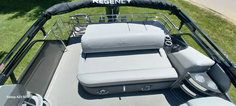 Slide: The Image of 2023 Regency 250 LE3 Sport pontoon boat with spacious seating and sleek design. - 35