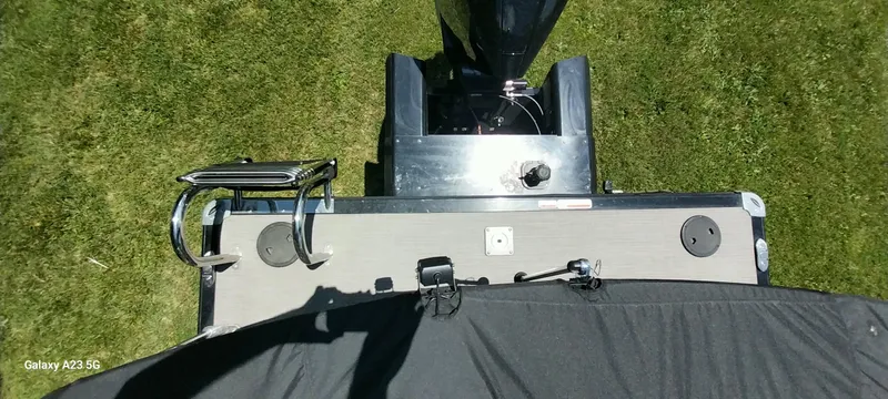 Slide: The Image of Overhead view of 2023 Regency 250 LE3 Sport boat on grass. - 37