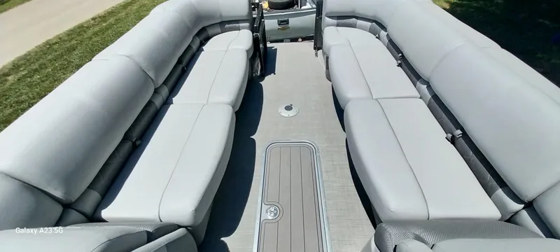 Slide: The Image of 2023 Regency 250 LE3 Sport pontoon boat with spacious seating and modern design. - 41