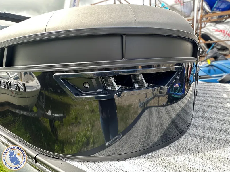 Slide: The Image of 2025 Bennington 23 LXSSB boat front view with sleek design and modern detailing. - 12