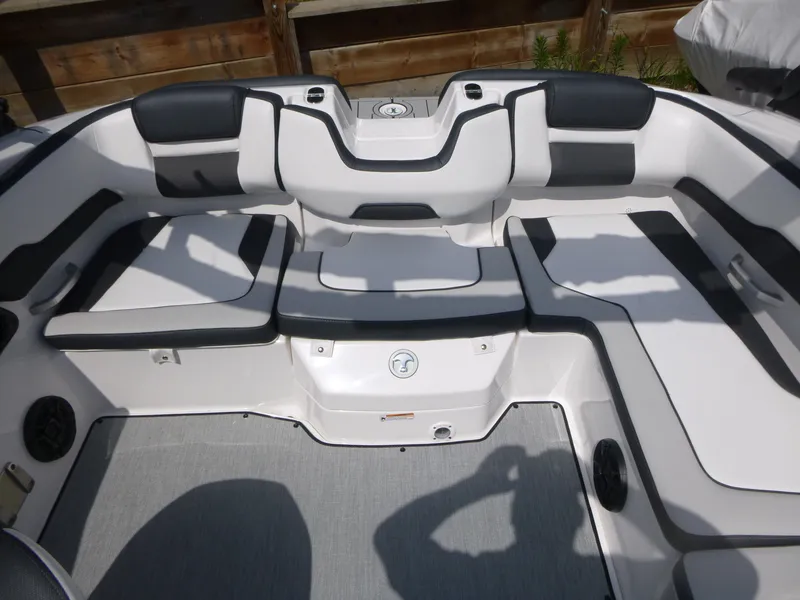 Slide: The Image of 2025 Yamaha Boats AR195 interior seating with black and white upholstery. - 9