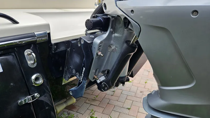 Slide: The Image of 2021 Scout 231 XS boat engine mount detail on a brick surface. - 20