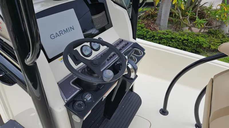 Slide: The Image of 2021 Scout 231 XS boat dashboard with Garmin navigation system. - 38