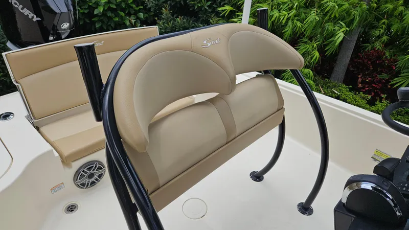Slide: The Image of 2021 Scout 231 XS boat interior with beige seating and black frame. - 40