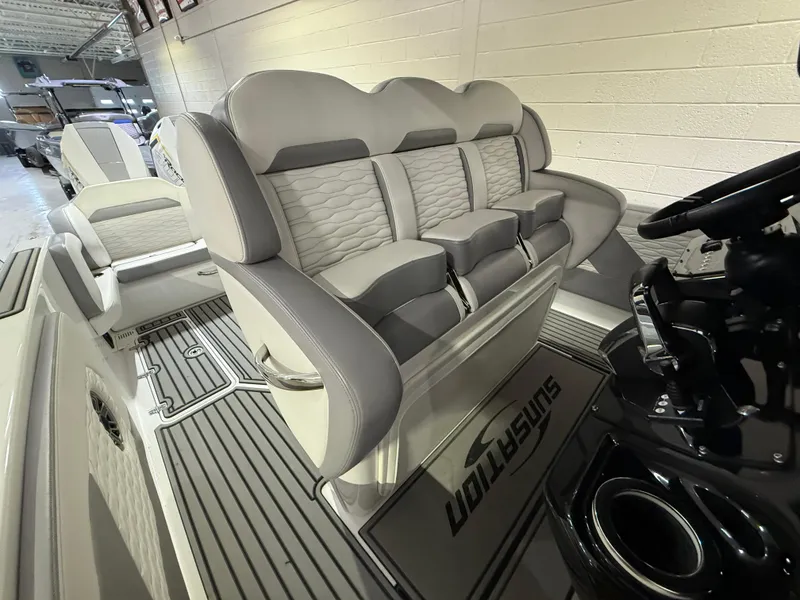 Slide: The Image of 2024 Sunsation 34 CCX boat interior with luxurious seating and modern design. - 12