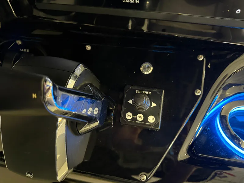 Slide: The Image of Control panel of 2024 Sunsation 34 CCX boat with Sleipner thruster switch. - 15
