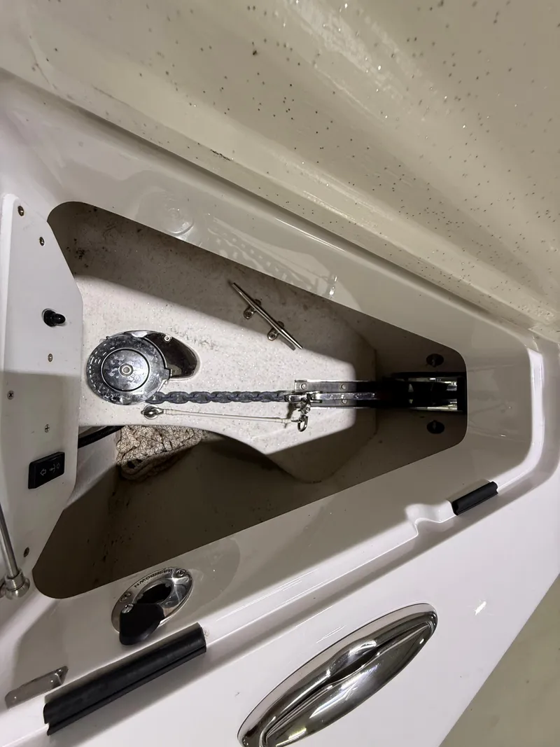 Slide: The Image of 2024 Sunsation 34 CCX anchor compartment with chain and winch system. - 28