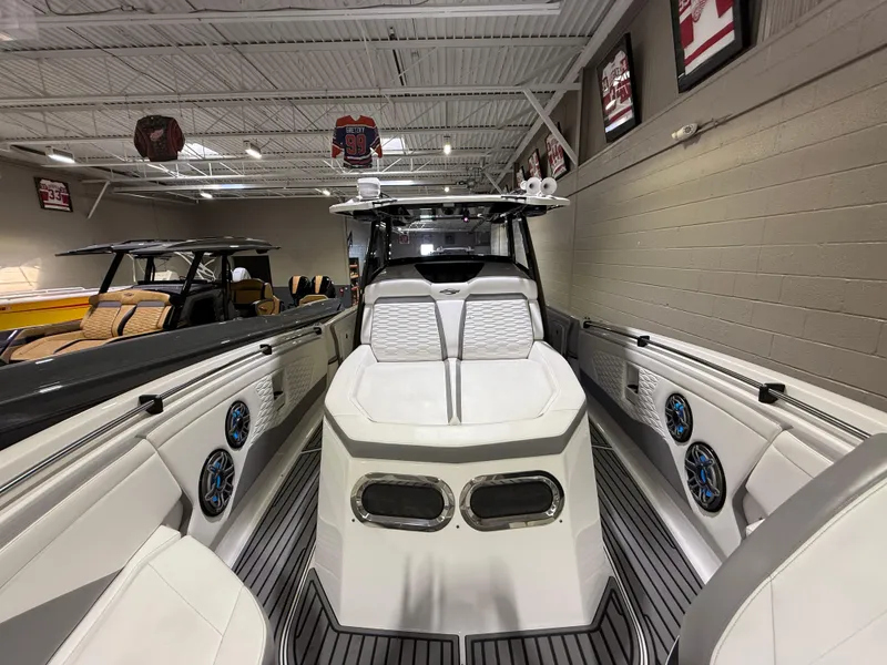 Slide: The Image of 2024 Sunsation 34 CCX boat interior with sleek seating and modern design. - 29