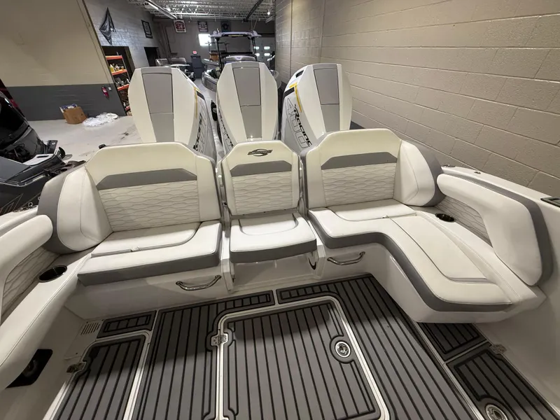 Slide: The Image of 2024 Sunsation 34 CCX boat interior with white seating and modern design. - 9
