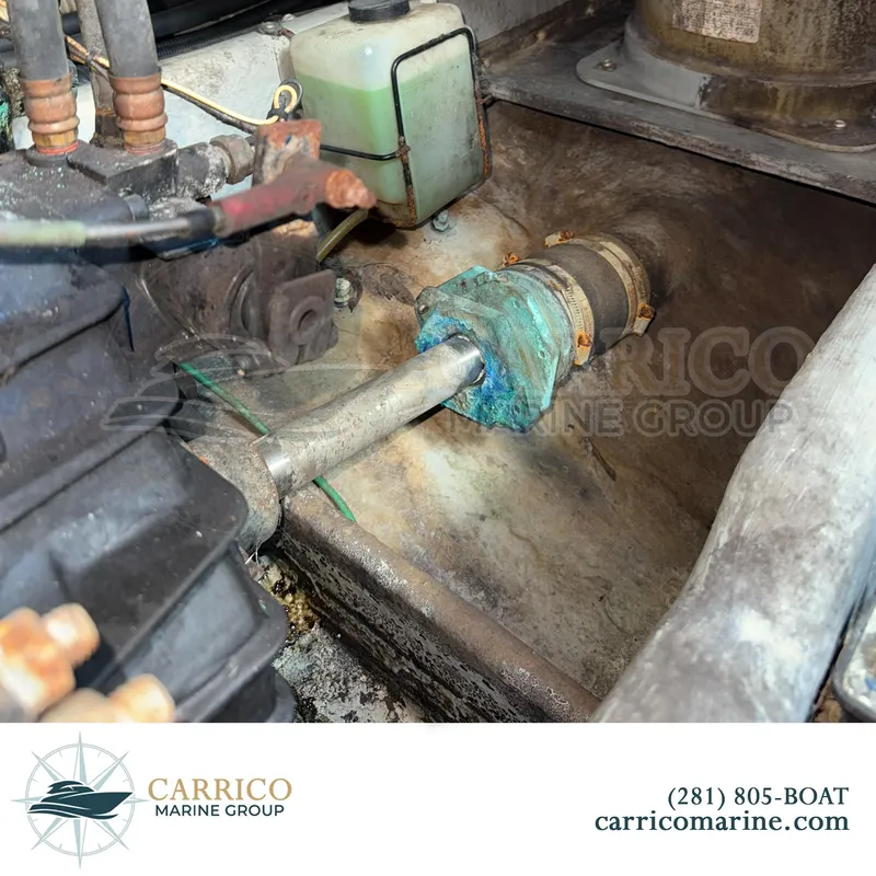 Slide: The Image of Engine compartment of a 1990 Sea Ray 390 Express Cruiser with visible components. - 45