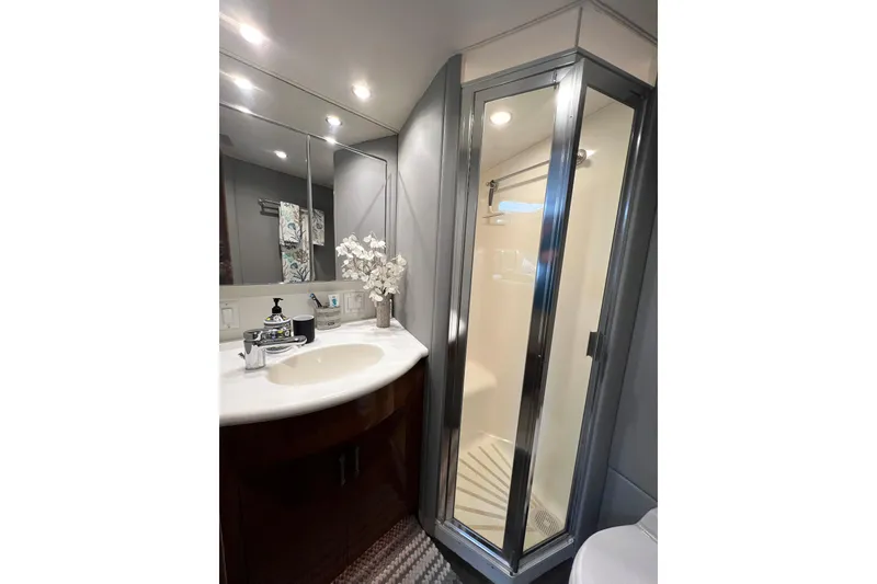 Slide: The Image of Bathroom interior of 2000 Hatteras 60 Convertible yacht with shower and vanity. - 39