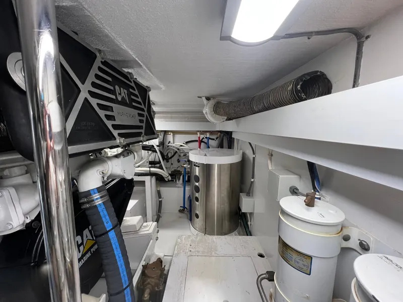 Slide: The Image of Engine room of 2000 Hatteras 60 Convertible yacht with CAT marine power components. - 47